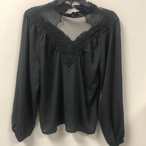 Toby and Olive black long sleeve blouse gently used size S
